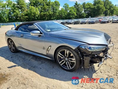 Czwarte zdjęcie samochodu z boku: 2021 BMW M850XI VIN:WBAFY4C06MCG49943 - miniatura