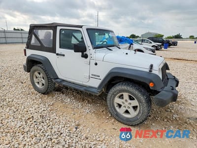 Czwarte zdjęcie samochodu z boku: 2015 JEEP WRANGLER SPORT VIN:1C4AJWAG1FL601375 - miniatura