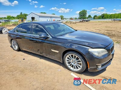 Czwarte zdjęcie samochodu z boku: 2013 BMW 750 LXI VIN:WBAYF8C52DD140067 - miniatura