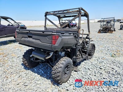 Czwarte zdjęcie samochodu z boku: 2026 POLARIS RANGER 1000 UTILITY VEHICLE VIN:3NSTAE996TH251994 - miniatura