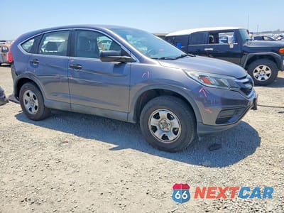 Czwarte zdjęcie samochodu z boku: 2015 HONDA CR-V LX VIN:2HKRM4H37FH696417 - miniatura
