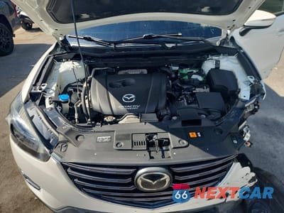 Zdjęcie 12 z 13 samochodu: 2016 MAZDA CX-5 GT VIN:JM3KE4DY1G0611366 - miniatura