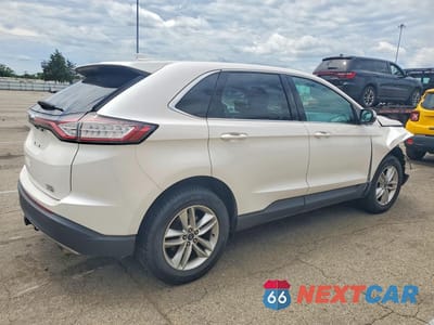 Trzecie zdjęcie samochodu z tyłu: 2016 FORD EDGE SEL VIN:2FMPK4J92GBB87632 - miniatura