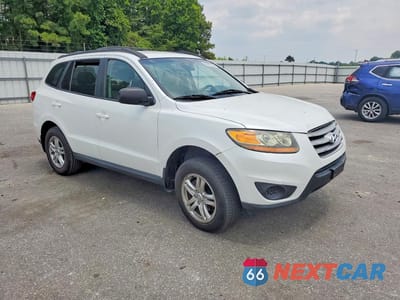 Czwarte zdjęcie samochodu z boku: 2012 HYUNDAI SANTA FE GLS VIN:5XYZGDAB8CG116975 - miniatura