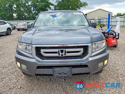 Piąte zdjęcie samochodu w środku: 2010 HONDA RIDGELINE RTL VIN:5FPYK1F51AB004820 - miniatura