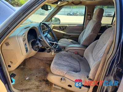 Zdjęcie 7 z 12 samochodu: 1999 GMC JIMMY VIN:1GKDT13W7X2524991 - miniatura