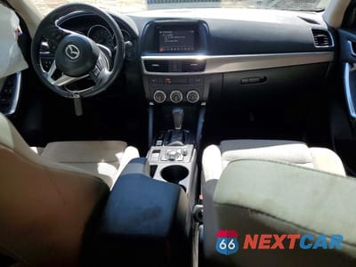 Zdjęcie 8 z 13 samochodu: 2016 MAZDA CX-5 TOURING VIN:JM3KE2CY9G0780282 - miniatura