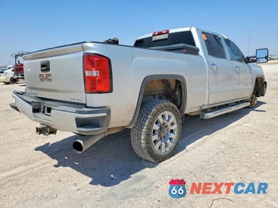 Trzecie zdjęcie samochodu z tyłu: 2019 GMC SIERRA K2500 DENALI VIN:1GT12SEY9KF273432 - miniatura
