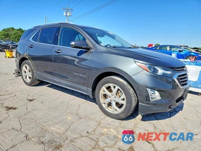 Czwarte zdjęcie samochodu z boku: 2018 CHEVROLET EQUINOX LT VIN:3GNAXKEX9JS565723 - miniatura