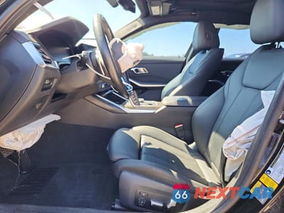 Zdjęcie 7 z 12 samochodu: 2021 BMW 330E VIN:WBA5P7C07MFL06070 - miniatura