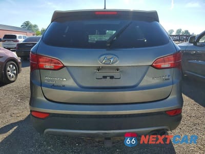 Zdjęcie 6 z 13 samochodu: 2013 HYUNDAI SANTA FE SPORT 2.0T VIN:5XYZUDLA7DG107912 - miniatura