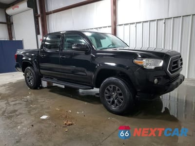 Czwarte zdjęcie samochodu z boku: 2023 TOYOTA TACOMA SR5 V6 VIN:3TMCZ5AN2PM595936 - miniatura