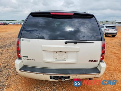 Zdjęcie 6 z 12 samochodu: 2011 GMC YUKON DENALI VIN:1GKS2EEF2BR214200 - miniatura