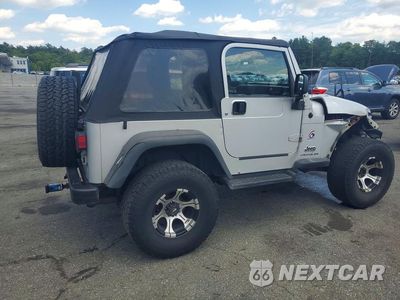 Trzecie zdjęcie samochodu z tyłu: 2003 JEEP WRANGLER COMMANDO VIN:1J4FA39S53P363364 - miniatura