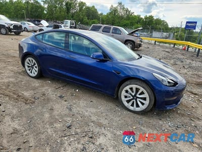 Czwarte zdjęcie samochodu z boku: 2022 TESLA 3 VIN:5YJ3E1EA7NF185940 - miniatura