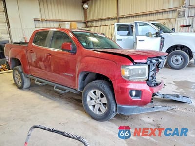Czwarte zdjęcie samochodu z boku: 2016 GMC CANYON SLE VIN:1GTG5CE32G1349606 - miniatura