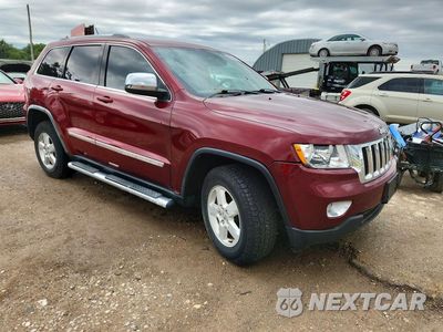 Czwarte zdjęcie samochodu z boku: 2012 JEEP GRAND CHEROKEE VIN:1C4RJFAG7CC182477 - miniatura
