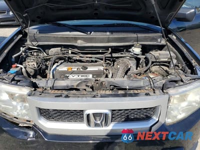 Zdjęcie 12 z 14 samochodu: 2011 HONDA ELEMENT EX VIN:5J6YH2H70BL000214 - miniatura