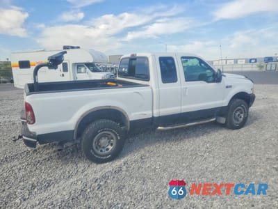 Trzecie zdjęcie samochodu z tyłu: 2003 FORD F250 SUPER DUTY VIN:1FTNX21S43ED28512 - miniatura
