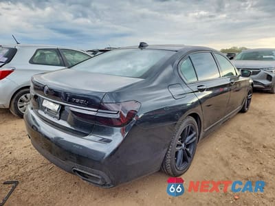 Trzecie zdjęcie samochodu z tyłu: 2018 BMW 750 XI VIN:WBA7F2C57JG423678 - miniatura