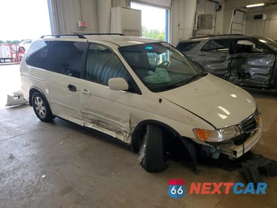 Czwarte zdjęcie samochodu z boku: 2003 HONDA ODYSSEY EXL VIN:5FNRL18983B022017 - miniatura