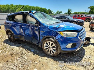 Czwarte zdjęcie samochodu z boku: 2017 FORD ESCAPE TITANIUM VIN:1FMCU0J95HUD87322 - miniatura