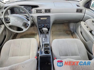 Zdjęcie 8 z 12 samochodu: 2001 TOYOTA CAMRY LE VIN:JT2BG28K010601635 - miniatura