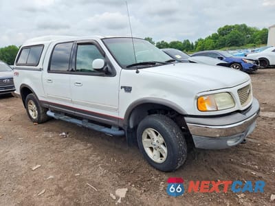 Czwarte zdjęcie samochodu z boku: 2003 FORD F150 SUPERCREW VIN:1FTRW08603KC71437 - miniatura