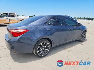 Trzecie zdjęcie samochodu z tyłu: 2019 TOYOTA COROLLA LE VIN:5YFBURHE2KP909660 - miniatura
