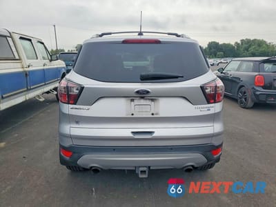 Zdjęcie 6 z 12 samochodu: 2017 FORD ESCAPE TITANIUM VIN:1FMCU9J90HUA51307 - miniatura