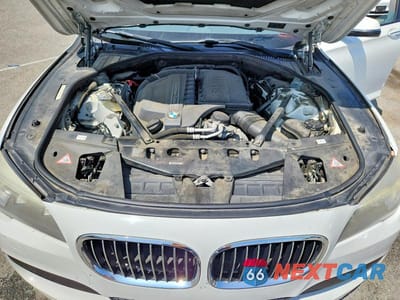 Zdjęcie 11 z 13 samochodu: 2013 BMW 740 I VIN:WBAYA6C50DD143813 - miniatura