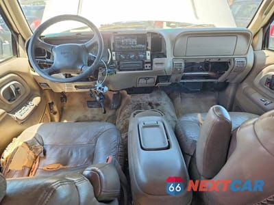 Zdjęcie 8 z 13 samochodu: 1999 GMC YUKON VIN:1GKEK13R0XJ734825 - miniatura