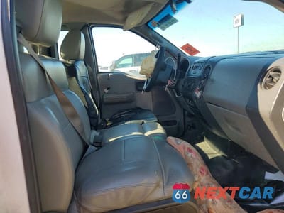 Zdjęcie 10 z 12 samochodu: 2005 FORD F150 VIN:1FTRF12205NC09890 - miniatura