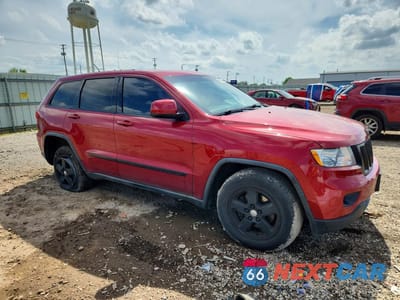 Czwarte zdjęcie samochodu z boku: 2011 JEEP GRAND CHEROKEE LAREDO VIN:1J4RR4GG5BC571616 - miniatura