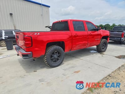 Trzecie zdjęcie samochodu z tyłu: 2018 CHEVROLET SILVERADO K1500 LT VIN:3GCUKREC7JG273890 - miniatura