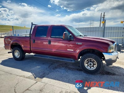 Czwarte zdjęcie samochodu z boku: 2004 FORD F250 SUPER DUTY VIN:1FTNW21P54EA35282 - miniatura
