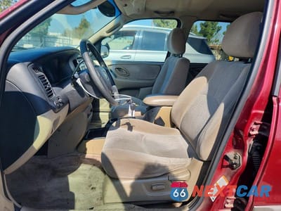 Zdjęcie 7 z 12 samochodu: 2003 MAZDA TRIBUTE LX VIN:4F2CZ04183KM29305 - miniatura