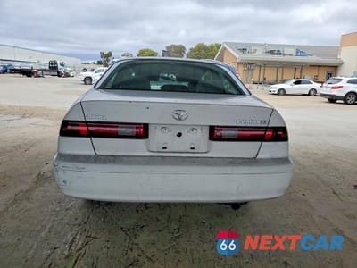 Zdjęcie 6 z 12 samochodu: 1999 TOYOTA CAMRY LE VIN:JT2BG22K7X0289606 - miniatura