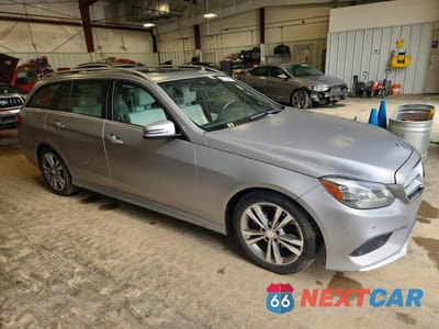 Czwarte zdjęcie samochodu z boku: 2014 MERCEDES-BENZ E 350 4MATIC WAGON VIN:WDDHH8JB9EA929962 - miniatura