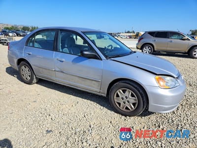 Czwarte zdjęcie samochodu z boku: 2003 HONDA CIVIC LX VIN:2HGES16533H511809 - miniatura