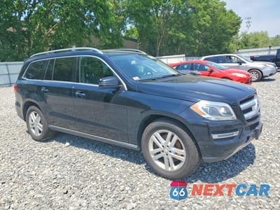 Czwarte zdjęcie samochodu z boku: 2015 MERCEDES-BENZ GL 350 BLUETEC VIN:4JGDF2EE8FA529033 - miniatura