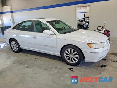 Czwarte zdjęcie samochodu z boku: 2007 HYUNDAI AZERA SE VIN:KMHFC46F87A210253 - miniatura