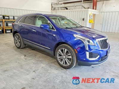 Czwarte zdjęcie samochodu z boku: 2024 CADILLAC XT5 PREMIUM LUXURY VIN:1GYKNCR42RZ757969 - miniatura