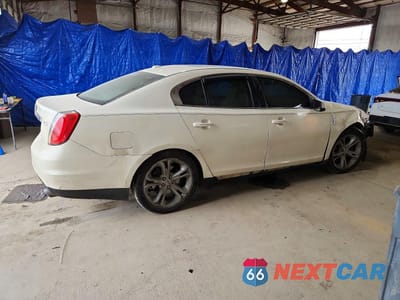 Trzecie zdjęcie samochodu z tyłu: 2009 LINCOLN MKS VIN:1LNHM93R79G623282 - miniatura