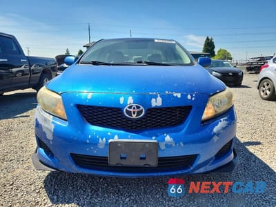 Piąte zdjęcie samochodu w środku: 2010 TOYOTA COROLLA LE VIN:JTDBU4EE7AJ081566 - miniatura