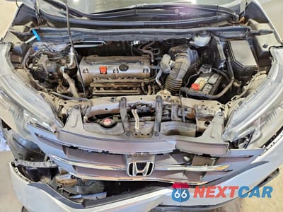 Zdjęcie 12 z 14 samochodu: 2012 HONDA CR-V EXL VIN:5J6RM4H74CL042415 - miniatura