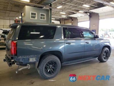 Trzecie zdjęcie samochodu z tyłu: 2019 CHEVROLET SUBURBAN K1500 LT VIN:1GNSKHKC7KR363829 - miniatura