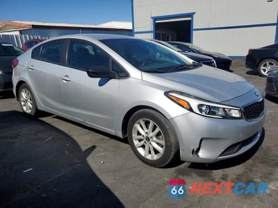 Czwarte zdjęcie samochodu z boku: 2017 KIA FORTE LX VIN:3KPFL4A76HE117007 - miniatura