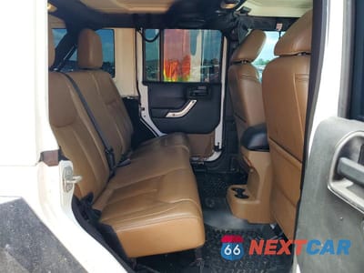 Zdjęcie 11 z 13 samochodu: 2014 JEEP WRANGLER UNLIMITED SAHARA VIN:1C4HJWEG9EL322926 - miniatura