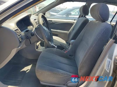 Zdjęcie 7 z 12 samochodu: 2002 TOYOTA COROLLA LE VIN:1NXBR12E52Z584769 - miniatura